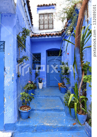 Chefchaouen, Morocco. Houses, streets and steps of old medina painted in blue Chefchaouen, Morocco. Houses, streets and steps of old medina painted in blue 132089101