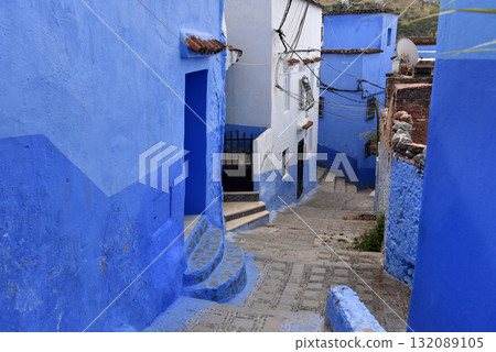 Chefchaouen, Morocco. Houses, streets and steps of old medina painted in blue Chefchaouen, Morocco. Houses, streets and steps of old medina painted in blue 132089105