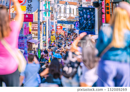 Tokyo cityscape, Japan. October 17th. Harajuku's Takeshita Street is bustling with foreign tourists as inbound tourism continues. Tokyo cityscape, Japan. October 17th. Harajuku's Takeshita Street is bustling with foreign tourists as inbound tourism continues. 132089269