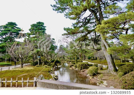 Kenrokuen Garden: A quiet landscape of moss and trees along the meandering stream, Kanazawa City, Ishikawa Prefecture 132089935