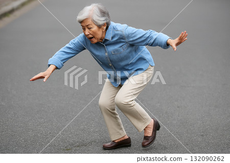 Senior woman about to fall 132090262