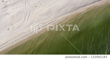 sandy beach on the seashore, view from above sandy beach on the seashore, view from above 132092165