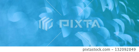 Abstract blue light bokeh with soft circular shapes and blurred background Abstract blue light bokeh with soft circular shapes and blurred background 132092849