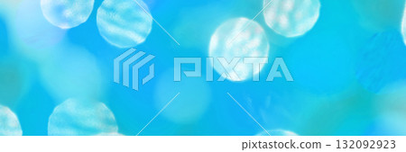 Abstract blue bokeh light background with soft circles and blurred effects Abstract blue bokeh light background with soft circles and blurred effects 132092923