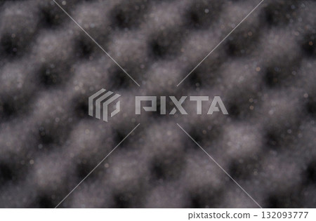 Close up of textured black acoustic foam panel for soundproofing in recording 132093777