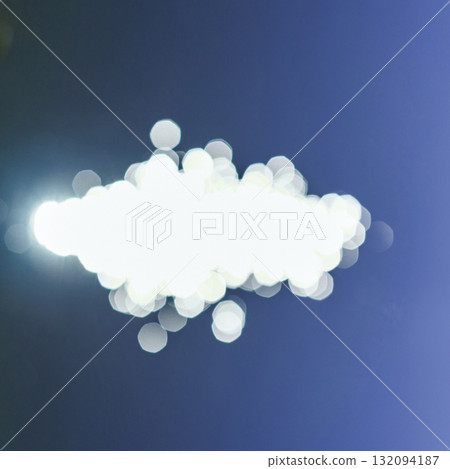 Abstract light bokeh against deep blue background with circular glow Abstract light bokeh against deep blue background with circular glow 132094187