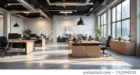 Urban office with polished concrete floors, modern wooden desks, and metal accents. The space features ambient lighting from sleek overhead 132094281