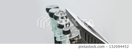 Modern cavitation machine with multiple applicators in a clinical setting for Modern cavitation machine with multiple applicators in a clinical setting for 132094452