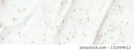 Smooth white textured surface with small red and black specks 132094612