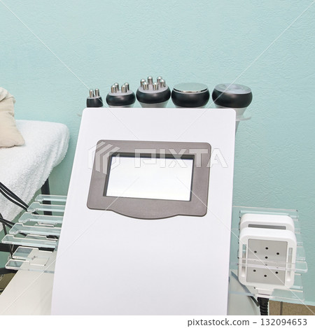 Modern aesthetic machine with various attachments in cosmetic clinic setting Modern aesthetic machine with various attachments in cosmetic clinic setting 132094653