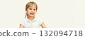 Smiling caucasian young girl in white shirt with light brown hair against soft 132094718