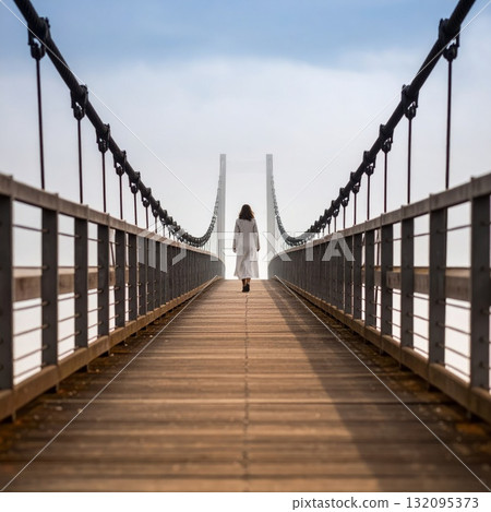 Woman on a long bridge or road, loneliness and meditation concept 132095373