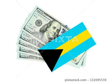 Small Bahamas flag lying on top of US dollar bills, symbolizing a money laundering scandal, isolated on a transparent background 132095539