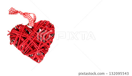 Red decorative woven heart symbolizing love and romance, with copy space for text or design, isolated on a transparent background 132095543