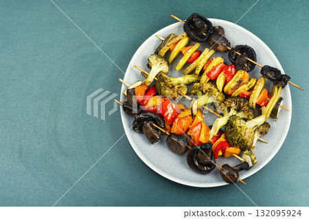 Pile of skewers with vegetables, barbeque. 132095924