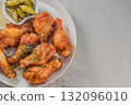 Savor the irresistible allure of these delicious, spicy buffalo chicken wings. Crispy, cooked to perfection and coated in a flavorful sauce, they are sprinkled with sesame seeds 132096010