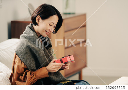 A woman receiving a gift 132097515