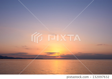 Serene Sunset Over Calm Ocean Serene Sunset Over Calm Ocean 132097632