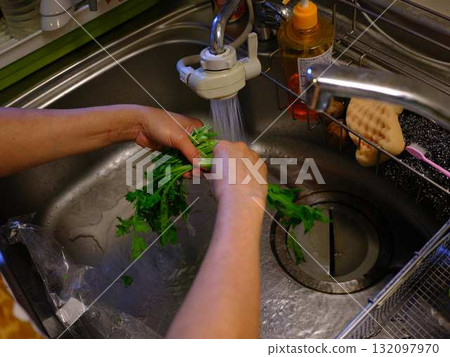 Kitchen cooking vegetables cutting woman hand tags Kitchen cooking vegetables cutting woman hand tags 132097970