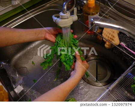 Kitchen cooking vegetables cutting woman hand tags Kitchen cooking vegetables cutting woman hand tags 132097974