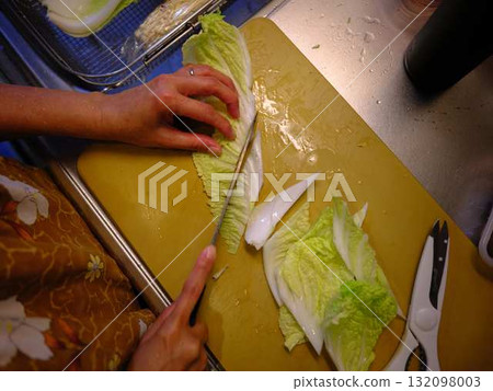 Kitchen cooking vegetables cutting woman hand tags Kitchen cooking vegetables cutting woman hand tags 132098003