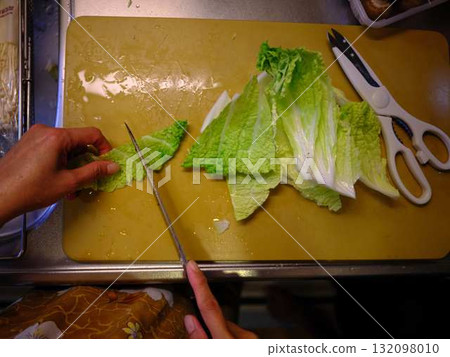 Kitchen cooking vegetables cutting woman hand tags Kitchen cooking vegetables cutting woman hand tags 132098010