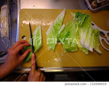 Kitchen cooking vegetables cutting woman hand tags 132098019