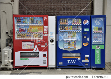 Two colorful vending machines against a brick wall, offering various drinks in Osaka, Japan Two colorful vending machines against a brick wall, offering various drinks in Osaka, Japan 132098082