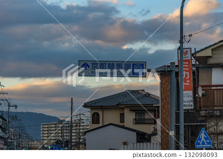 Street sign pointing to Kyoto Race Course in Kyoto, Japan 132098093
