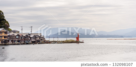 Traditional wooden fishermen Funaya boathouses in Ine, north Kyoto prefecture on the Sea of Japan Traditional wooden fishermen Funaya boathouses in Ine, north Kyoto prefecture on the Sea of Japan 132098107