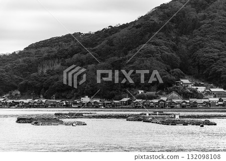 Traditional wooden fishermen Funaya boathouses in Ine, north Kyoto prefecture on the Sea of Japan Traditional wooden fishermen Funaya boathouses in Ine, north Kyoto prefecture on the Sea of Japan 132098108