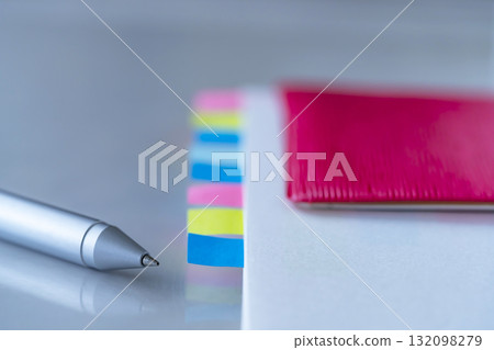Documents and notebook on the table 132098279