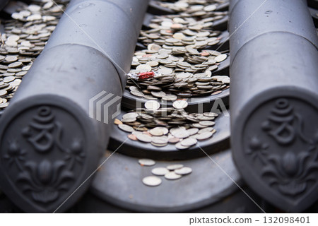 Coins on Traditional Japanese Roof Coins on Traditional Japanese Roof 132098401