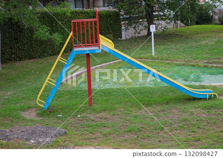 Park playground equipment and colorful slides Park playground equipment and colorful slides 132098427