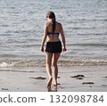 Young woman on the beach 132098784