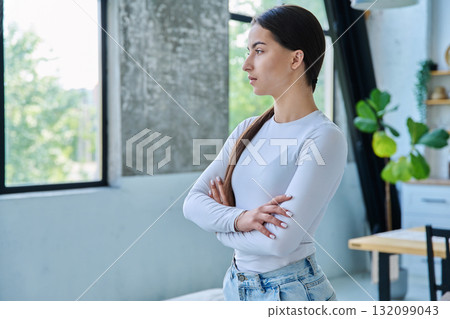 Portrait of beautiful stylish young teenage girl posing at home 132099043