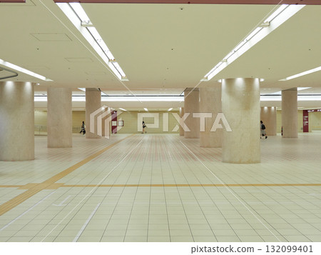 Commuting office workers crossing the underground plaza at Kanazawa Hospitality Dome 132099401