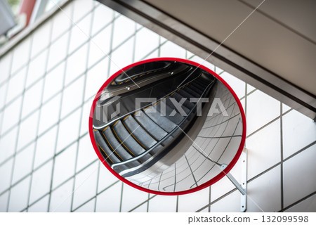 Convex Mirror Reflecting Staircase in Tiled Hallway Convex Mirror Reflecting Staircase in Tiled Hallway 132099598