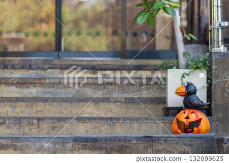 A carved pumpkin Halloween decoration on stone steps, in Seoul, South Korea 132099625