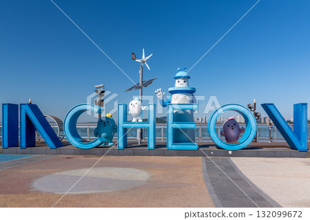 Colorful Incheon sign with cartoon characters and wind turbine in Incheon, South Korea 132099672