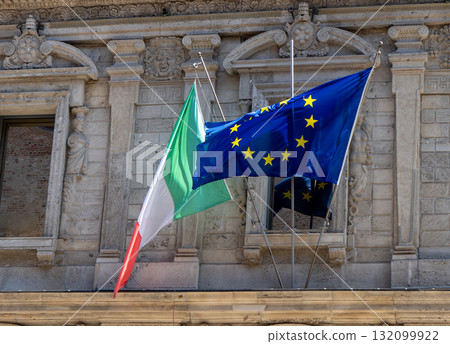 The flag of Italy and the European Union on the facade of old Italian House in Milan The flag of Italy and the European Union on the facade of old Italian House in Milan 132099922