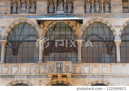 Piazza Mercanti Milan old street houses architecture in center city Milan. Italian building. Windows wall arch facade 132099923