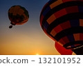 Silhouette hot air balloon over mountains in sunset sky 132101952