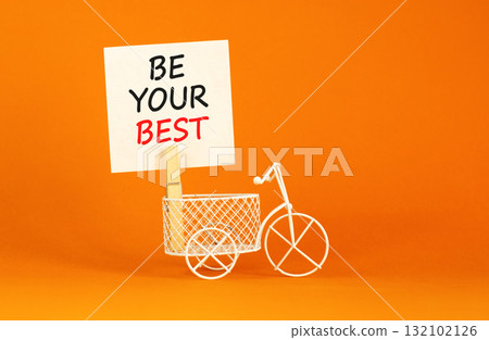 Motivational be your best symbol. Concept words Be your best on beautiful white paper on clothespin. Beautiful orange background. Business motivational be your best concept. Copy space. Motivational be your best symbol. Concept words Be your best on beautiful white paper on clothespin. Beautiful orange background. Business motivational be your best concept. Copy space. 132102126