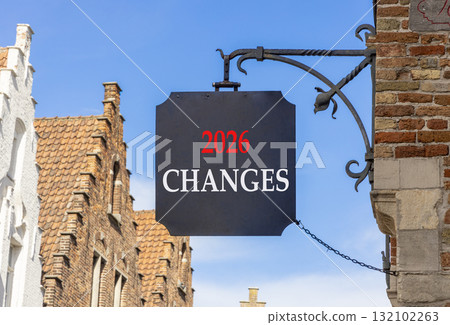 2026 Changes symbol. Concept words 2026 Changes on beautiful black road sign. Beautiful street and buildings in Brugge blue sky background. Business and 2026 changes concept. Copy space. 2026 Changes symbol. Concept words 2026 Changes on beautiful black road sign. Beautiful street and buildings in Brugge blue sky background. Business and 2026 changes concept. Copy space. 132102263