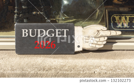 Budget 2026 symbol. Concept words Budget 2026 on beautiful black wooden hand sign. Beautiful shop display background. Business and budget 2026 concept. Copy space. 132102273