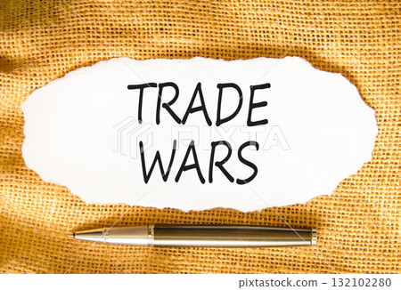 Trade wars symbol. Concept word Trade wars on beautiful white paper. Beautiful canvas background. Black pen. Business trade wars concept. Copy space. Trade wars symbol. Concept word Trade wars on beautiful white paper. Beautiful canvas background. Black pen. Business trade wars concept. Copy space. 132102280