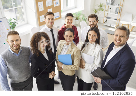 Group Portrait Of Happy Business Team Working Together Group Portrait Of Happy Business Team Working Together 132102925