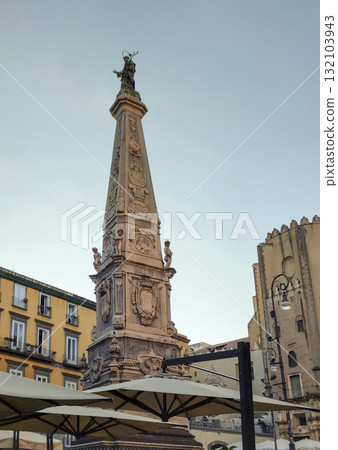 Naples, Italy - Piazza San Domenico Maggiore and the apse area of the church with people around in the historical center of Naples, Italy 132103943