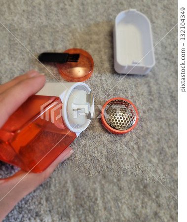 Lint Remover Battery Compartment Open Back View Lint Remover Battery Compartment Open Back View 132104349